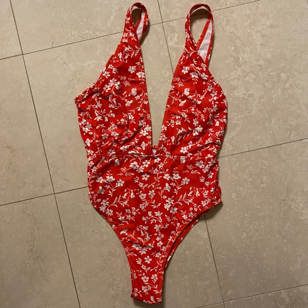 red floral one piece suit